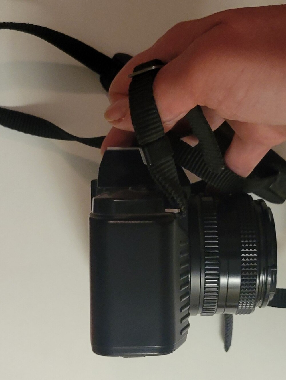 Canon black film camera with 50mm FD f/1.8 lens and neck strap - Picture 3 of 6